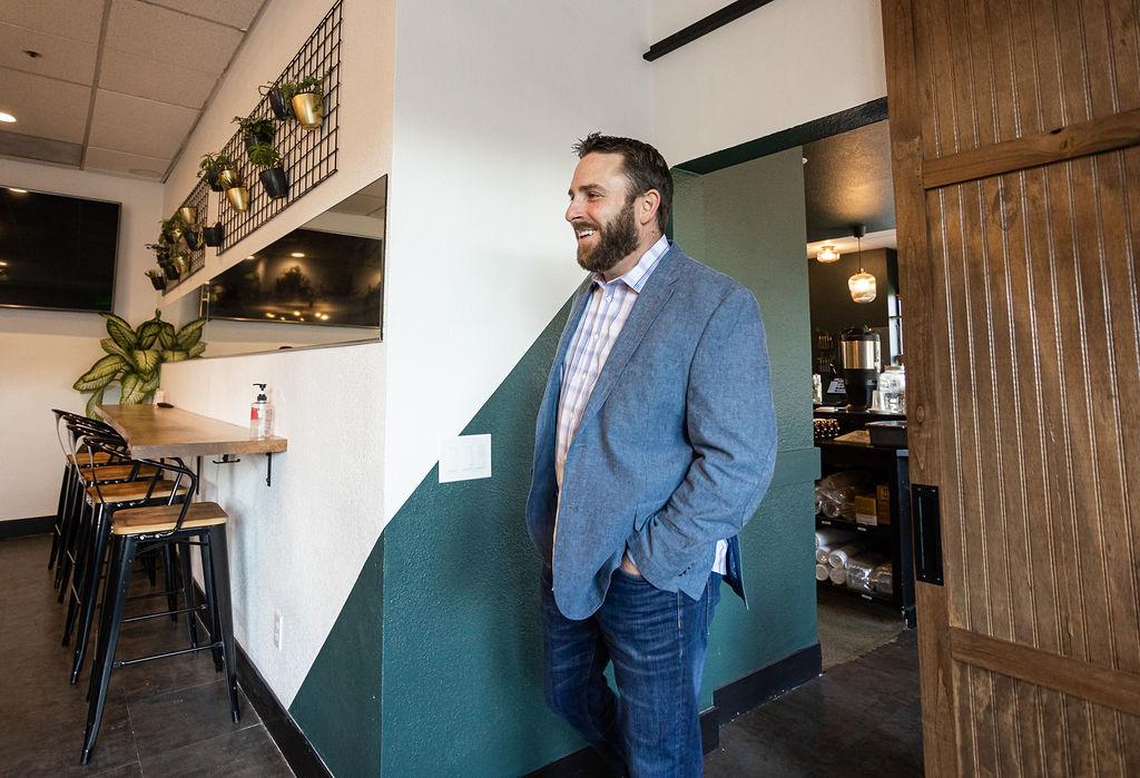 Man in blazer inside Granite City Workspaces, Folsom CA