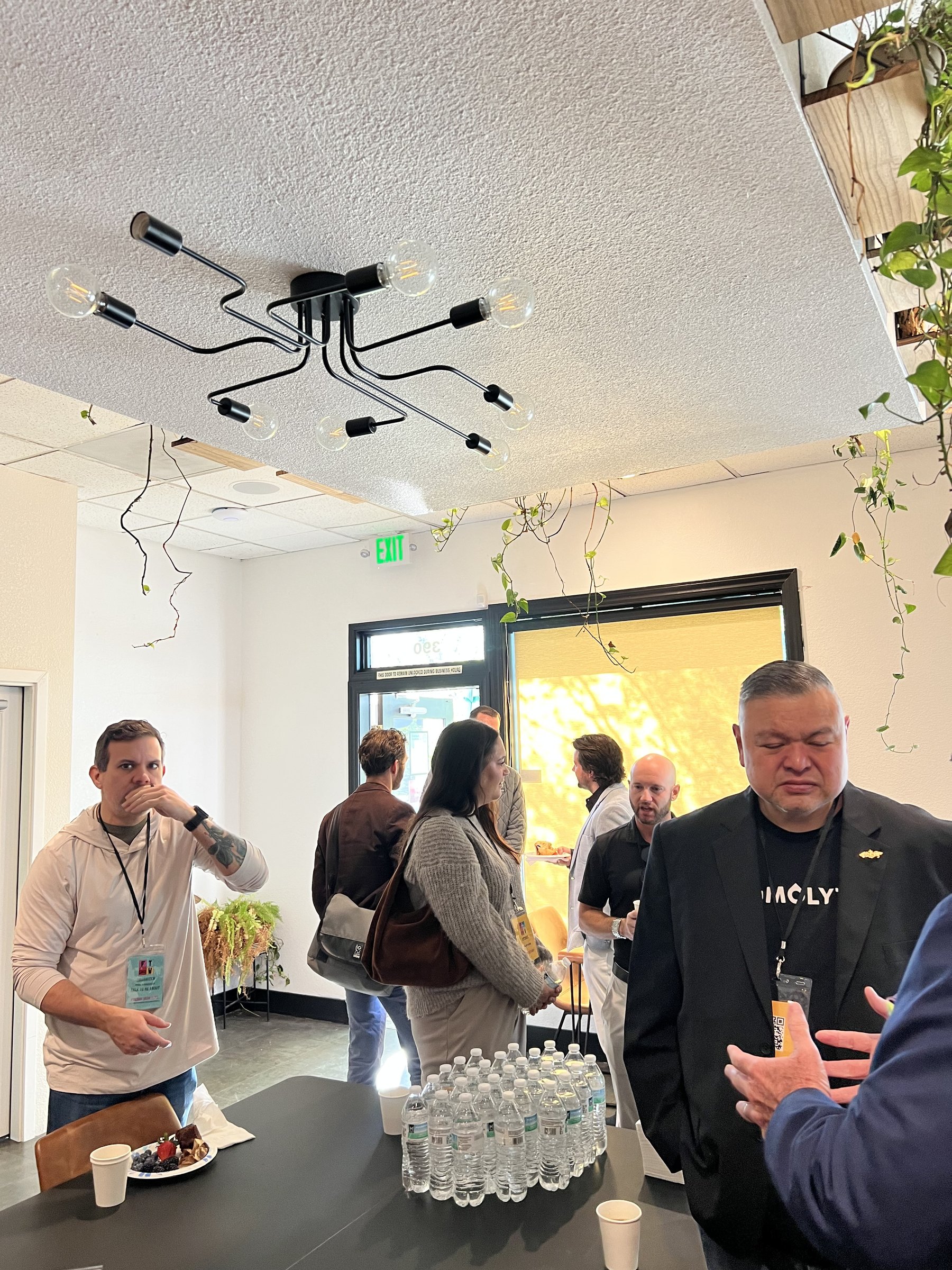 Guests mingling in The Nook at Granite City Workspaces in Folsom